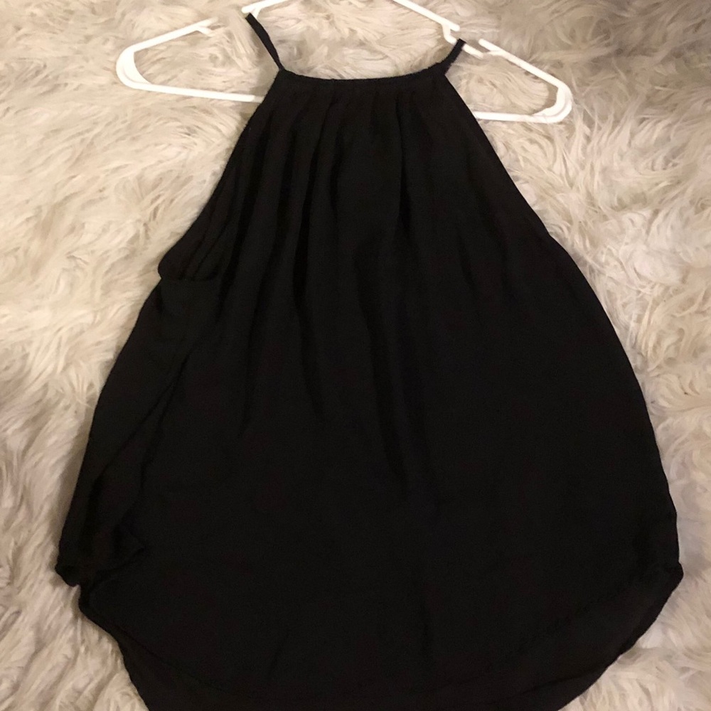 Sleeveless black blouse